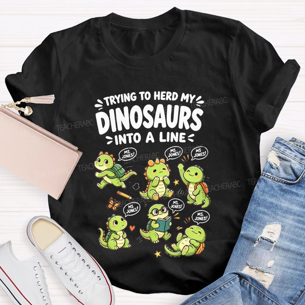 Personalized Name Trying To Herd My Dinosaurs Into A Line Teacher T-Shirt
