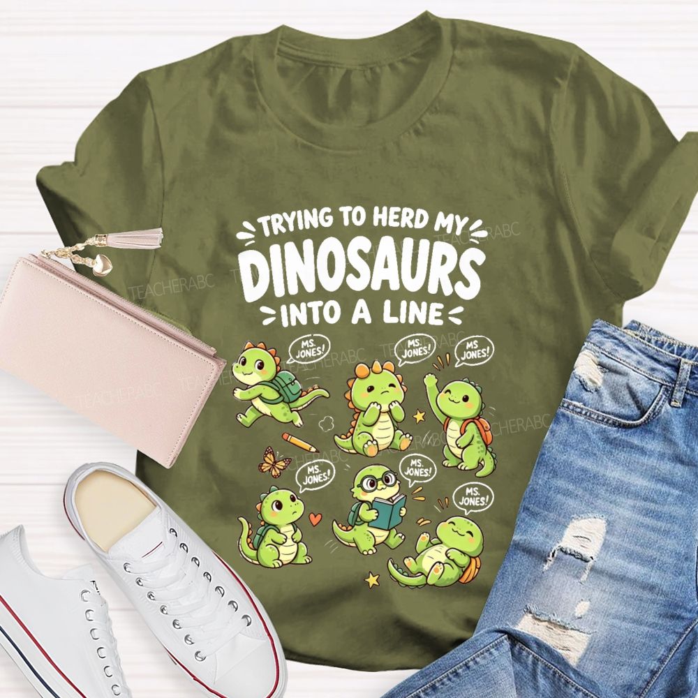 Personalized Name Trying To Herd My Dinosaurs Into A Line Teacher T-Shirt