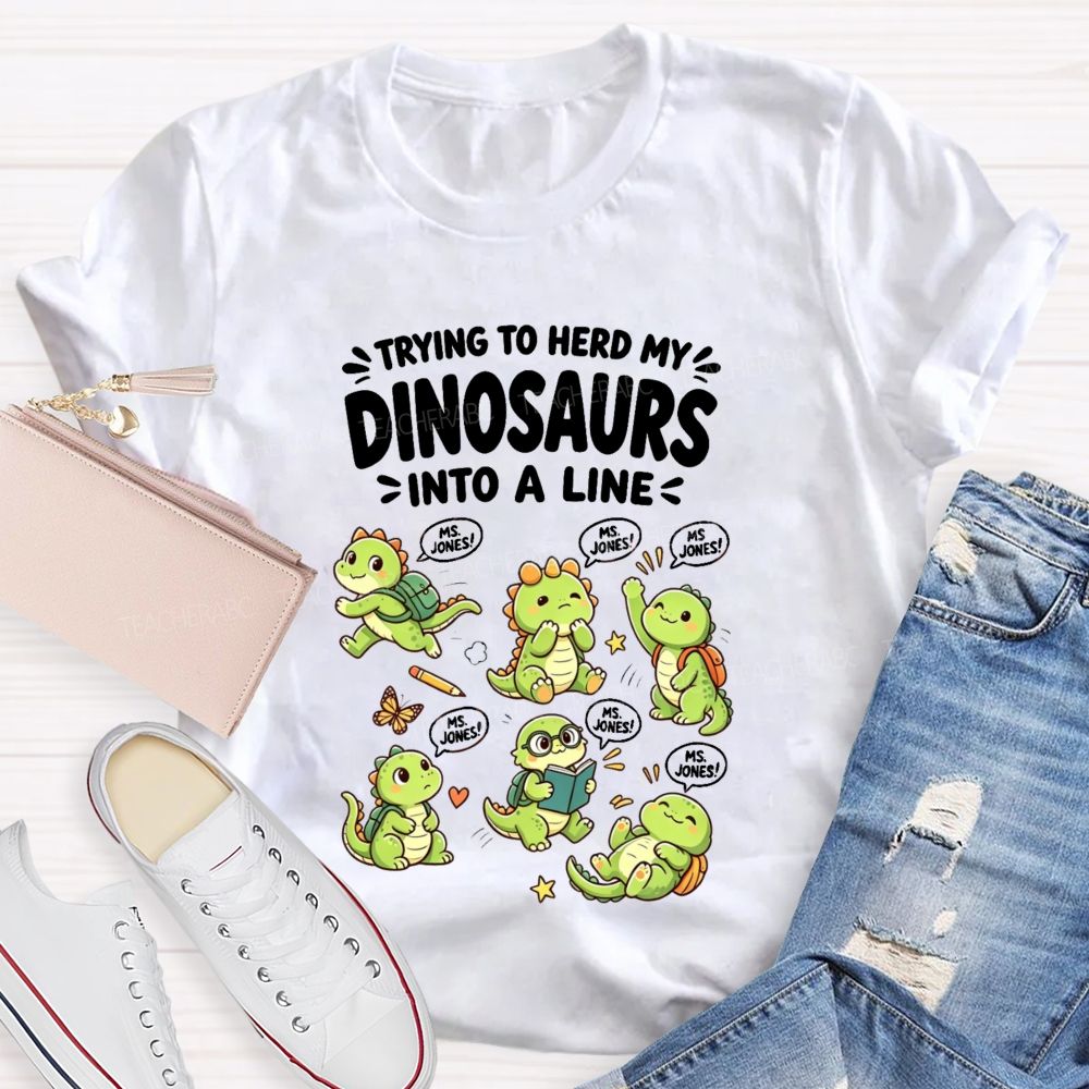 Personalized Name Trying To Herd My Dinosaurs Into A Line Teacher T-Shirt