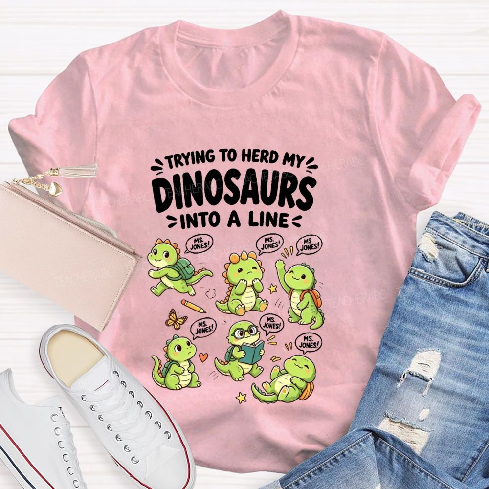 Personalized Name Trying To Herd My Dinosaurs Into A Line Teacher T-Shirt