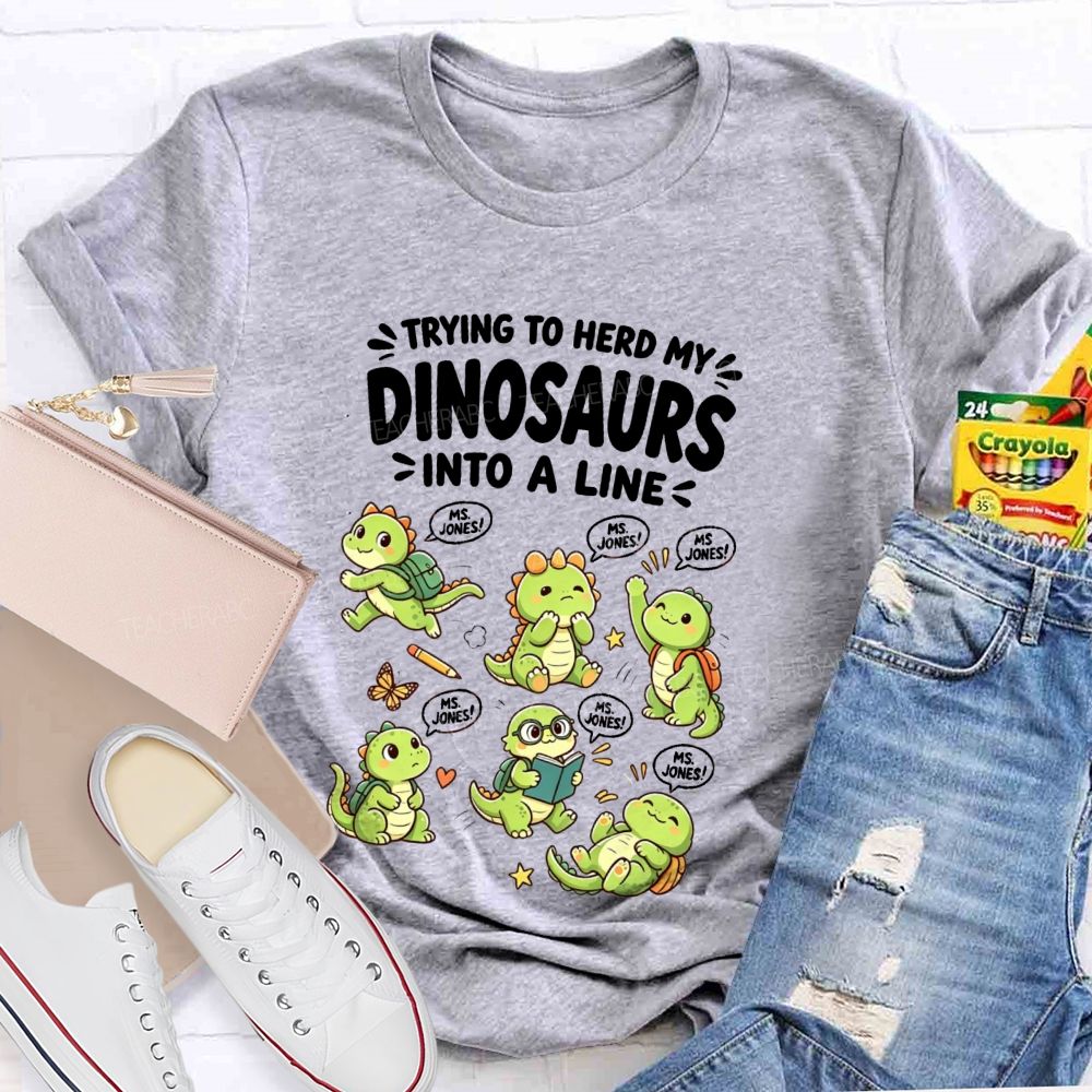 Personalized Name Trying To Herd My Dinosaurs Into A Line Teacher T-Shirt