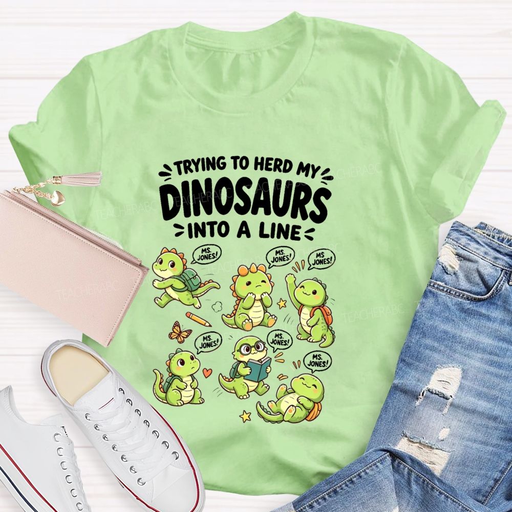 Personalized Name Trying To Herd My Dinosaurs Into A Line Teacher T-Shirt