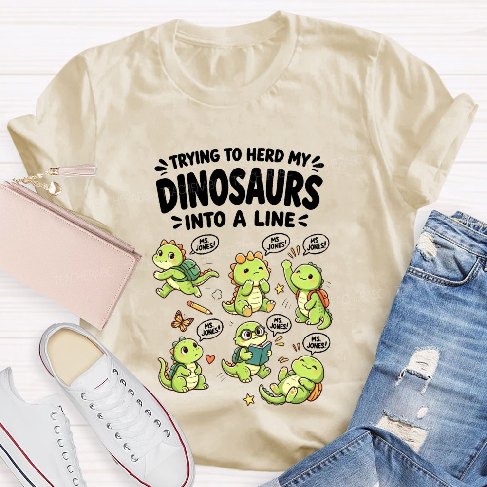 Personalized Name Trying To Herd My Dinosaurs Into A Line Teacher T-Shirt