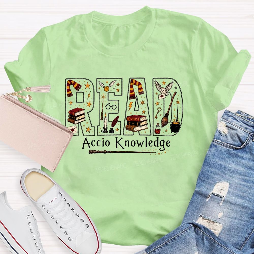 Read Accio Knowledge Halloween Teacher T-shirt