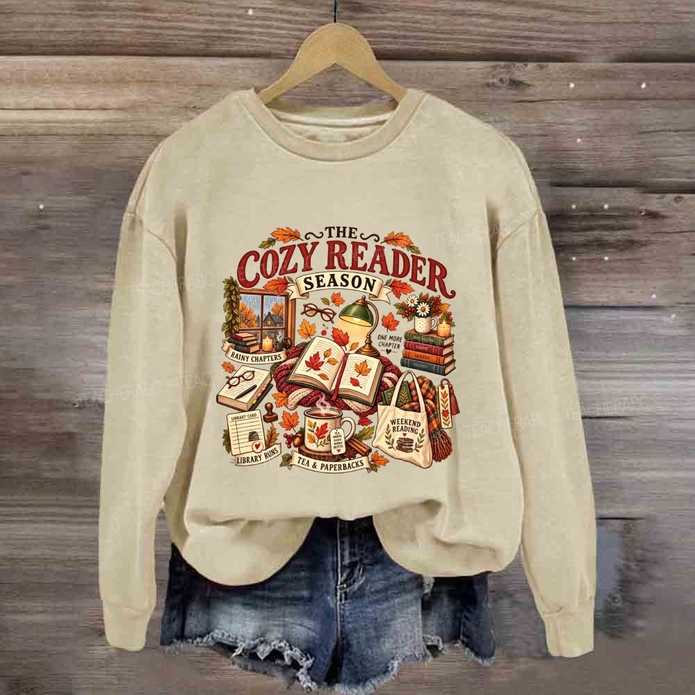 The Cozy Reader Season Rainy Chapters Library Runs Sweatshirt