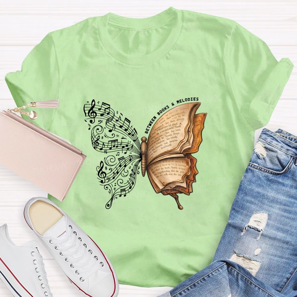 Between Books And Melodies Book Music Butterfly Teacher T-shirt