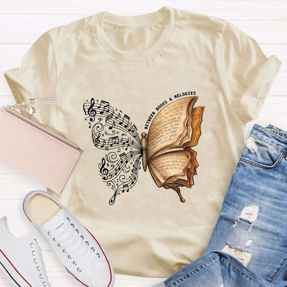 Between Books And Melodies Book Music Butterfly Teacher T-shirt