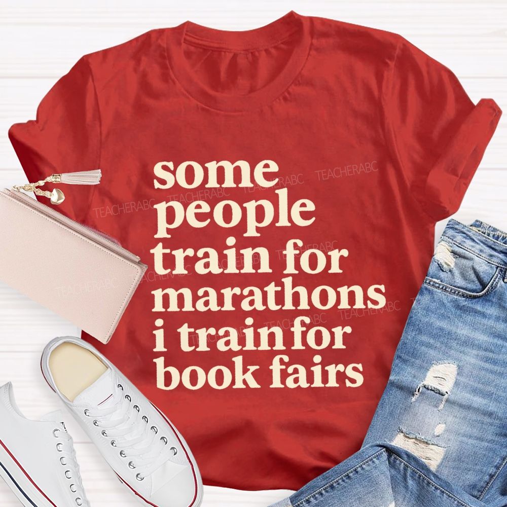Some People Train For Marathons I Train For Book Fairs Teacher T-shirt