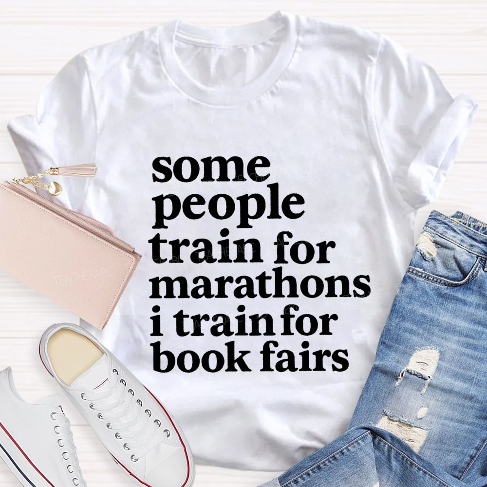 Some People Train For Marathons I Train For Book Fairs Teacher T-shirt