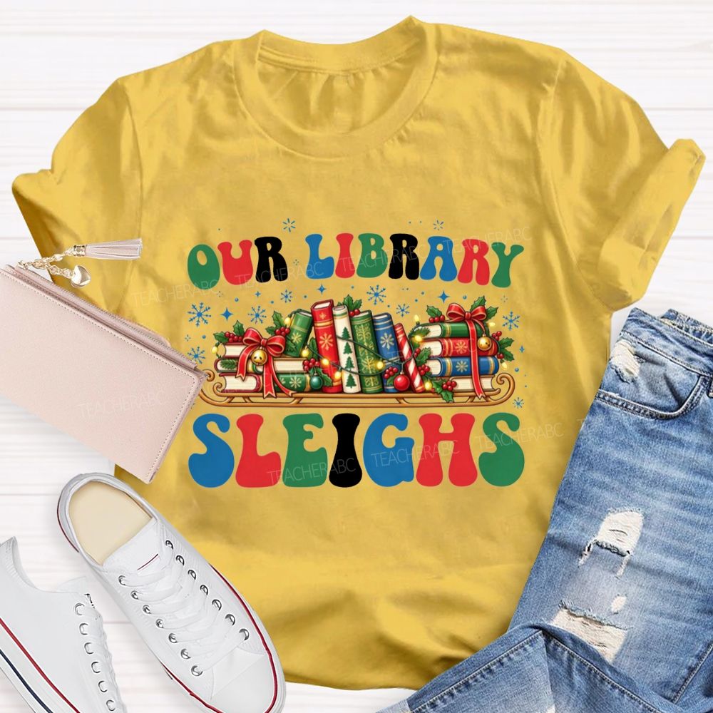 Our Library Sleighs Library Books And Christmas Cheer Teacher T-shirt
