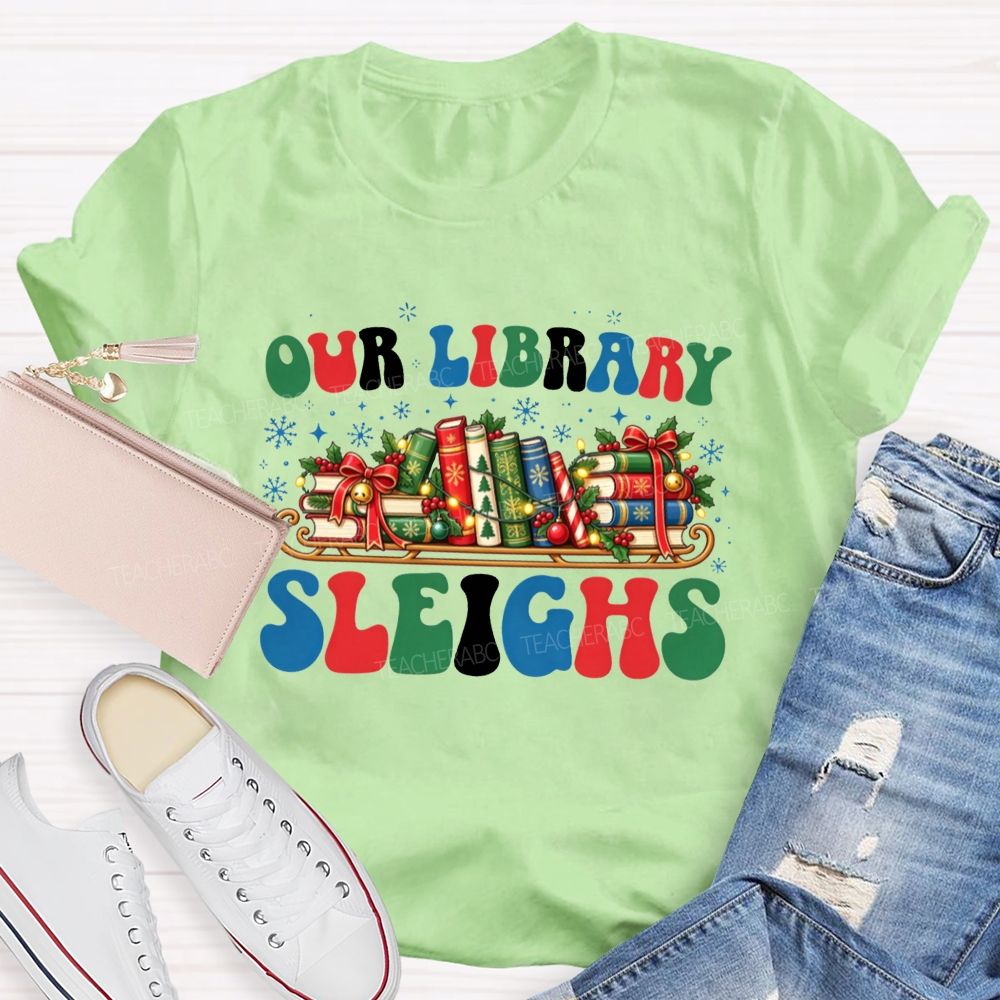 Our Library Sleighs Library Books And Christmas Cheer Teacher T-shirt