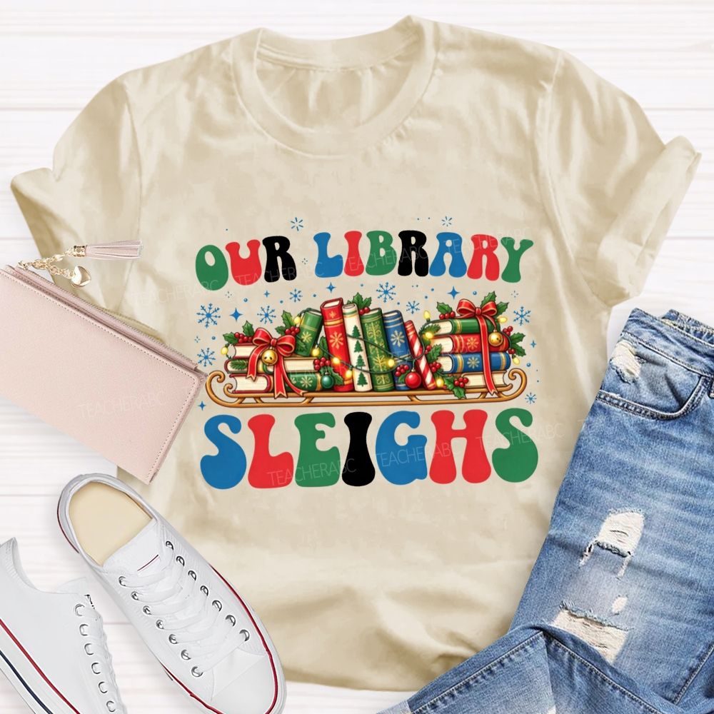 Our Library Sleighs Library Books And Christmas Cheer Teacher T-shirt
