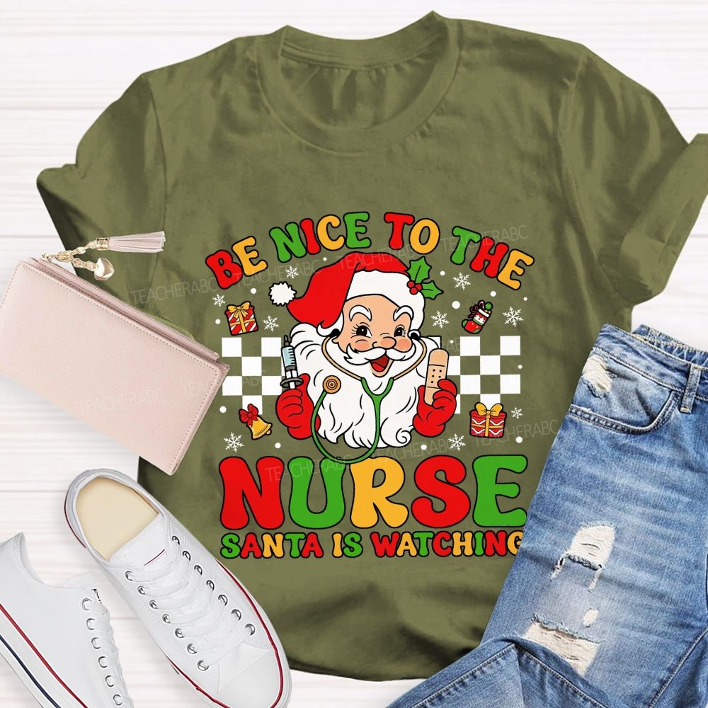 Be Nice To The Nurse Santa Is Watching Santa Claus With A Stethoscope Teacher T-shirt