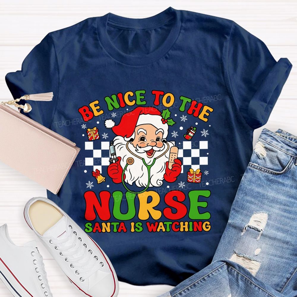 Be Nice To The Nurse Santa Is Watching Santa Claus With A Stethoscope Teacher T-shirt