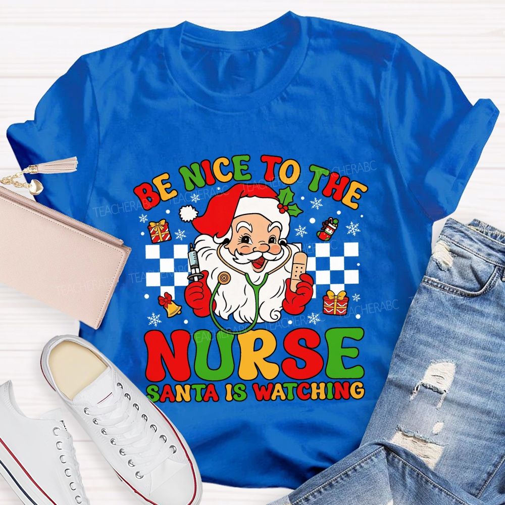 Be Nice To The Nurse Santa Is Watching Santa Claus With A Stethoscope Teacher T-shirt