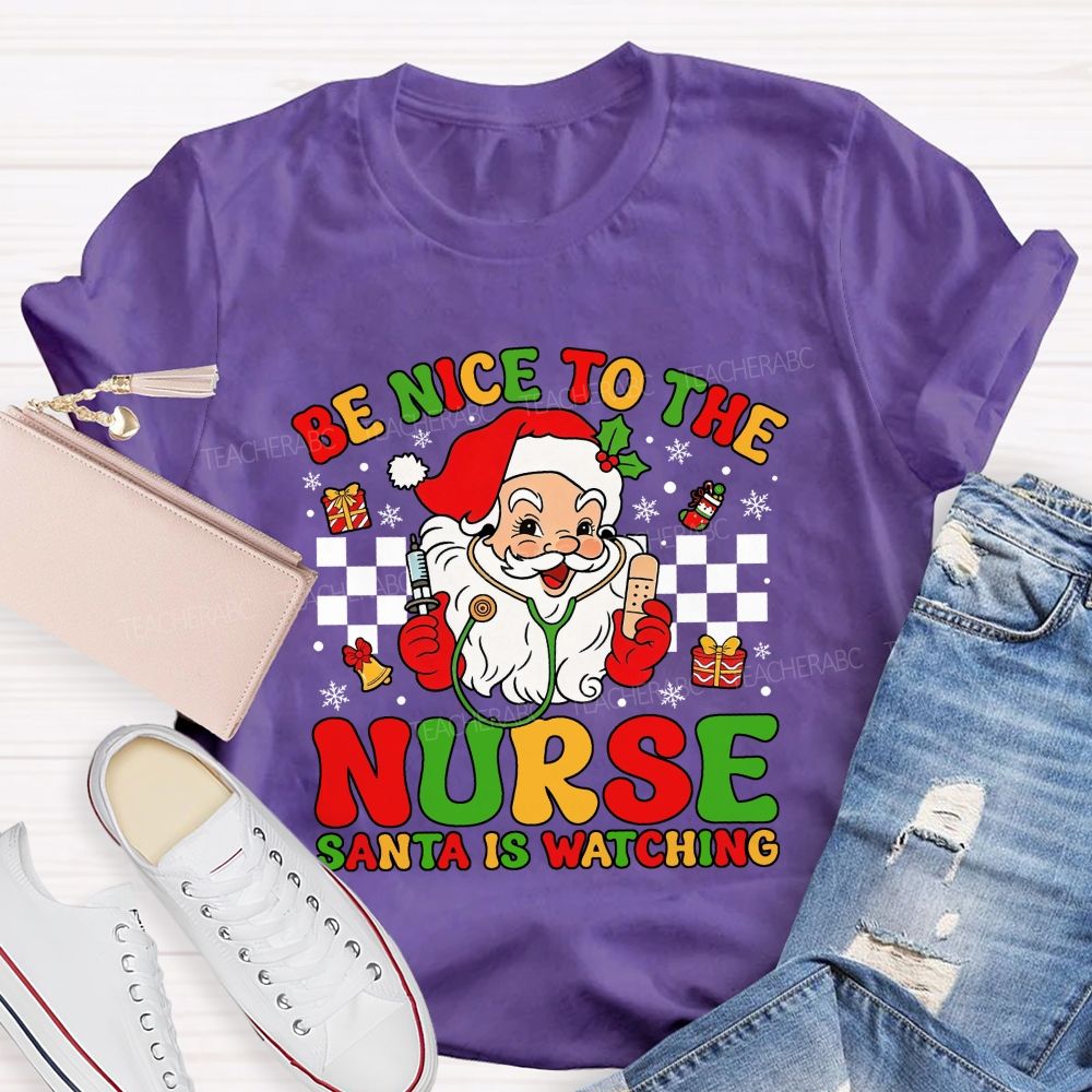Be Nice To The Nurse Santa Is Watching Santa Claus With A Stethoscope Teacher T-shirt