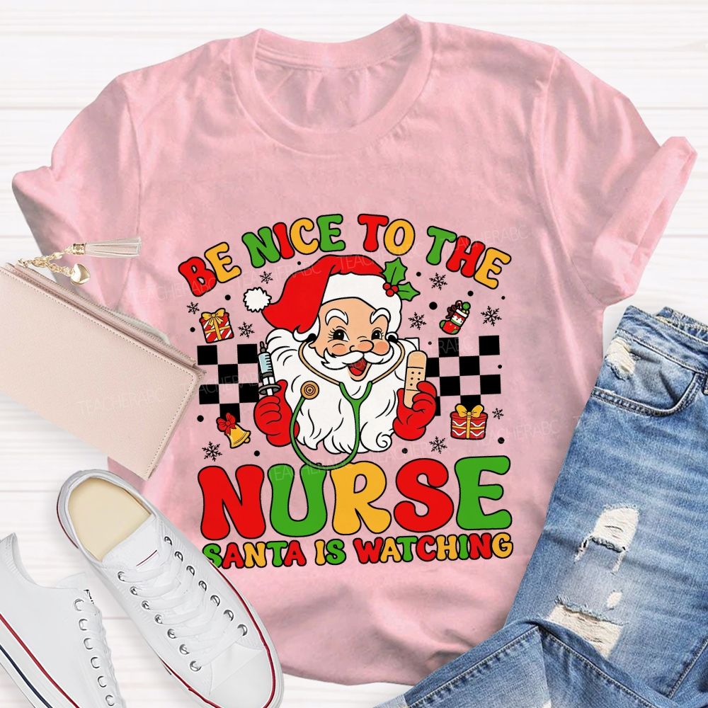Be Nice To The Nurse Santa Is Watching Santa Claus With A Stethoscope Teacher T-shirt