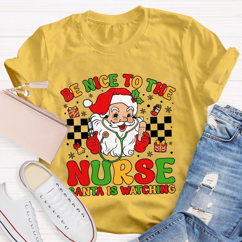 Be Nice To The Nurse Santa Is Watching Santa Claus With A Stethoscope Teacher T-shirt