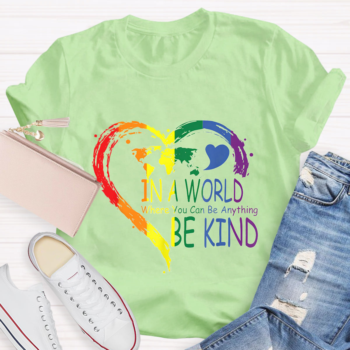 In A World Where You Can Be Anything Be Kin Colorful Heart T-Shirt