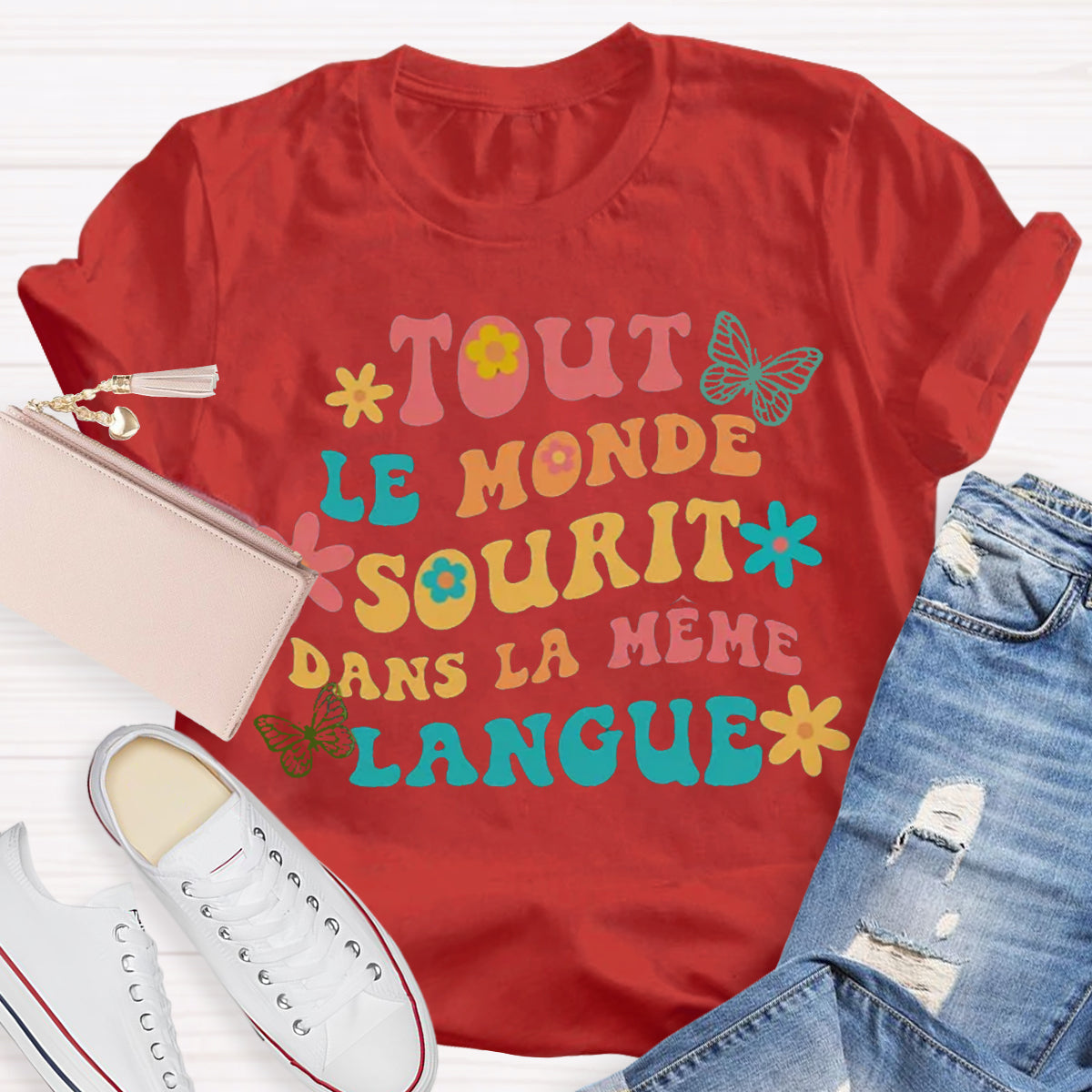 Tout Le Monde Sourit Dans La Même Langue French Teacher T-Shirt